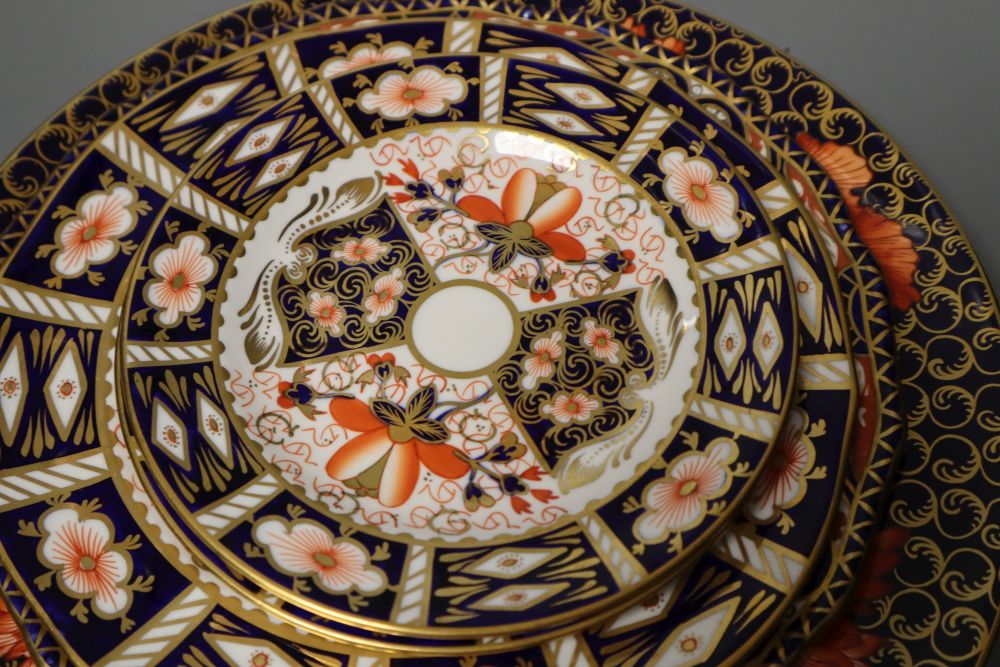 Six Royal Crown Derby imari plates including one Kings pattern and five 1128 pattern trays, 27cm